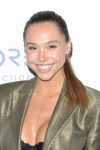 Alexis Ren cleavagy wearing bra and jacket at 8th Annual Thirst Gala in Beverly Hills