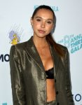 Alexis Ren cleavagy wearing bra and jacket at 8th Annual Thirst Gala in Beverly Hills