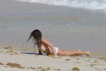 Brooke Burke topless showing off her breasts on beach in St. Barths