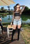 Hailee Steinfeld sexy wearing denim shorts and black boots