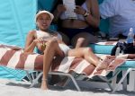 Karrueche Tran wearing white semi transparent bikini