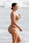 Kim Kardashian - curvy body in skimpy bikini - at the beach on vacation in Tulum