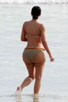 Kim Kardashian shows her fat ass at the beach on vacation in Tulum