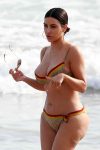Kim Kardashian - lovely cleavage in small bikini - at the beach on vacation in Tulum