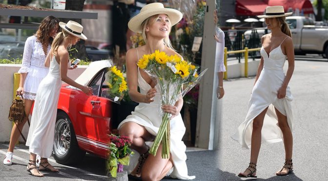 Kimberley Garner having oops moment when she kneel down exposing her white panties