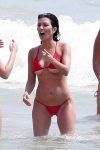 Kourtney Kardashian almost having bikini malfunction exposing her breasts at a Beach in Tulum