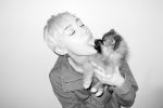 Miley Cyrus kissing puppy