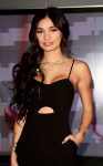 Pia Mia Perez as brunette sexy in black dress