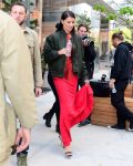 Adriana Lima sexy in red dress on set of a commercial shoot