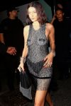 Bella Hadid braless with nipple pasties wearing sheer black dress at Met Gala 2017 after-party