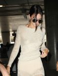 Kendall Jenner braless exposing nipples leaving New York and arriving to Nice France for Cannes festival