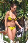 Rita Ora show off her perfect breasts wearing Yellow Bikini At Hotel du Cap-Eden-Roc in France