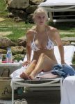 Ashley James - wearing a bikini by the pool in Marbella