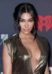 Chantel Jeffries looks sexy wearing low-cut gold dress showing off her boobs