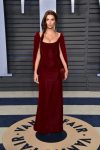 Emily Ratajkowski show off her sexy body wearing red dress at Oscar party