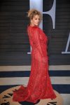 Rita Ora wearing sheer red dress shows panties and ass at Oscars party