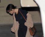 Selena Gomez braless wearing black tshirt