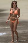 Zara Holland shows off her fit bikini body on the beach in Barbados