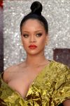 Rihanna show off big cleavage in London
