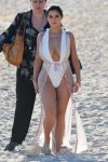 Demi Rose Mawby Revealing White Swimsuit