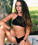 Melissa Lori posing slutty in skimpy bikini