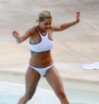 Rita Ora looking stunning in a white bikini in the French Riviera