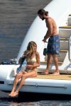 Heidi Klum Topless Sunbathing In Italy