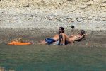 Heidi Klum Topless Sunbathing In Italy