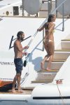Heidi Klum Topless Sunbathing In Italy