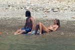 Heidi Klum Topless Sunbathing In Italy