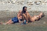 Heidi Klum Topless Sunbathing In Italy