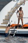 Heidi Klum Topless Sunbathing In Italy