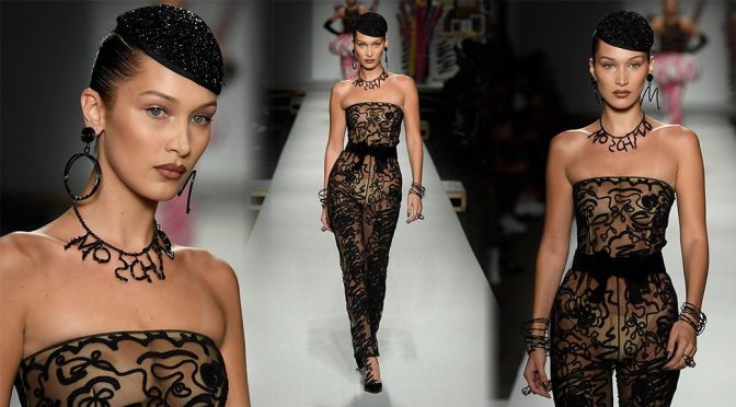 Bella Hadid – Braless See-Through at Moschino Fashion Show in Milan