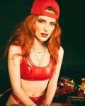 Belal Thorne Sexy in Red Latex Giving Glimpse of Pierced Nipple