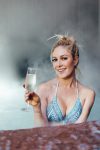 Heidi Montag shows nice boobs in bikini posing in pool in Aspen