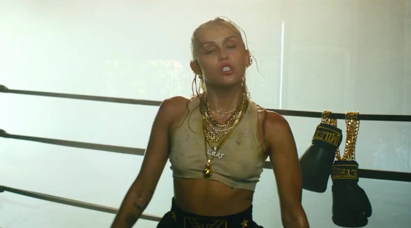 Miley Cyrus – “Don’t Call Me Angel” music Video Braless Pokies