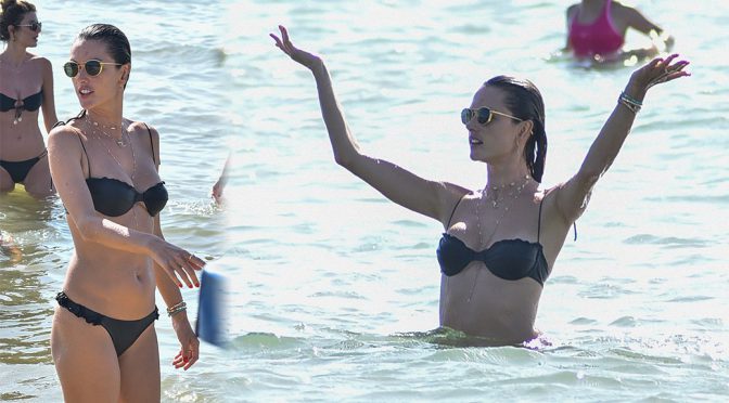 Alessandra Ambrosio – Sexy Boobs in Tiny Black Bikinion the Beach in Florianopolis
