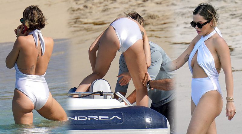 Rita Ora – Sexy Body in White Swimsuit on the Beach in Saint Barthelemy