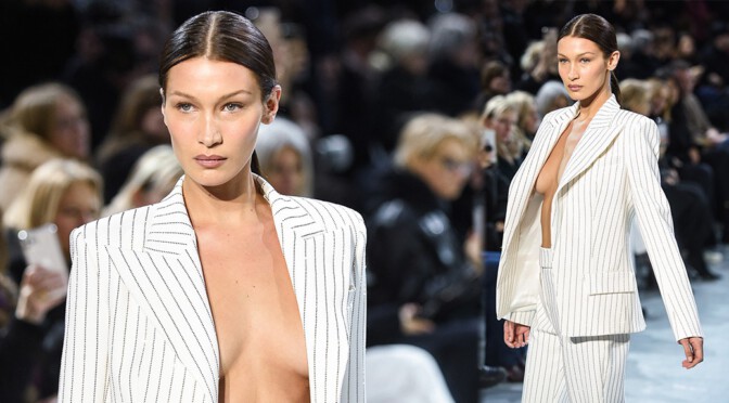 Bella Hadid – Sexy Braless Cleavage at the Alexandre Vauthier Fashion Show in Paris