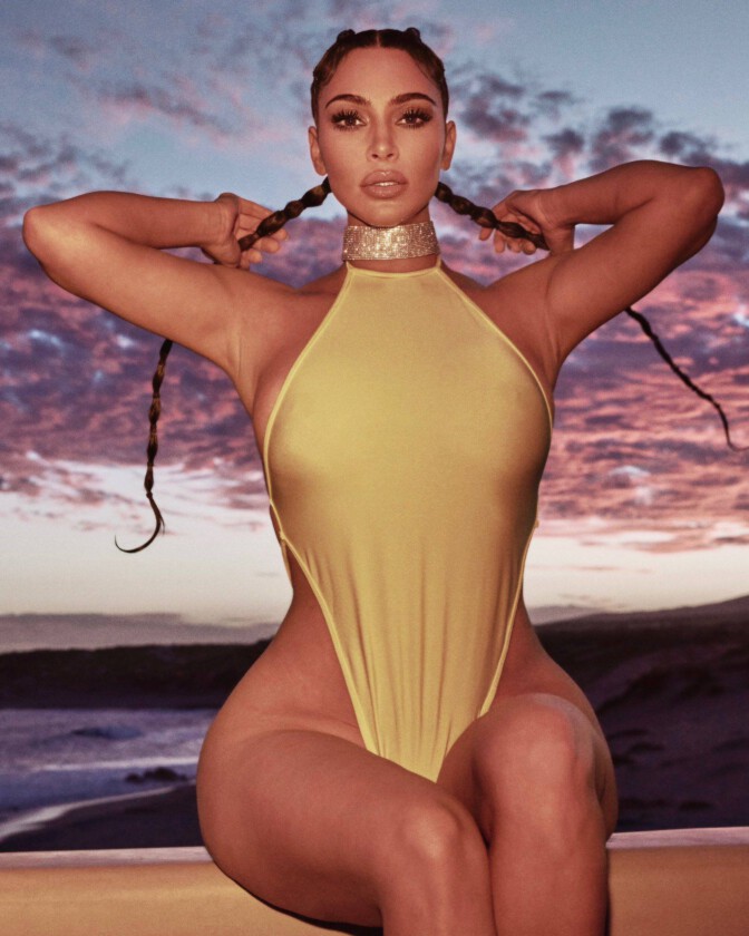 Kim Kardashian Hot Curves In Sexy Swimsuit