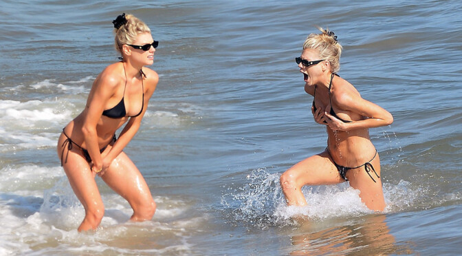 Charlotte McKinney – Beautiful Boobs in Sexy Black Bikini at the Beach in Malibu