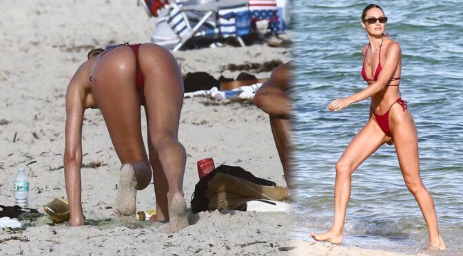 Candice Swanepoel – Fantastic Ass in a Tiny Red Bikini at the Beach in Miami Beach