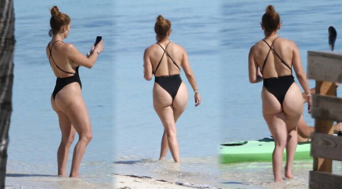 Jennifer Lopez – Fantastic Big Ass in a Black Swimsuit on the Beach in Turks and Caicos