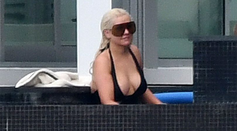 Christina Aguilera – Sexy Boobs in a Revealing Swimsuit in Miami