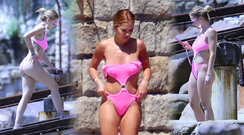 Rita Ora – Sexy Body and Pokies in a Pink Swimsuit in Sydney