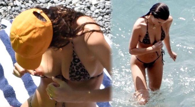 Emily Ratajkowski – Sexy Boobs Slip in Bikini on a Beach in Positano (NSFW)