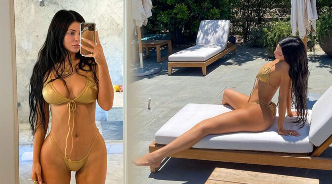 Kylie Jenner – Gorgeous Big Boobs in a Sexy Gold Bikini (Video)
