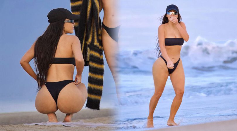 Kim Kardashian – Beautiful Big Ass in a Black Thong Bikini at the Beach in Malibu