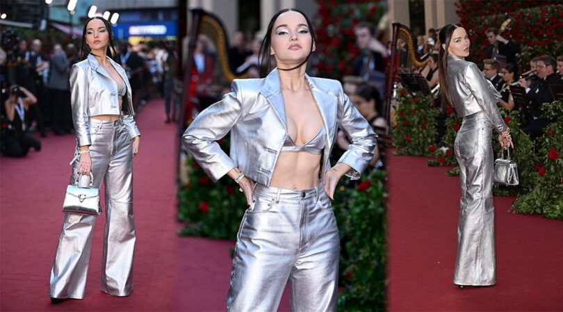 Dove Cameron Stuns in a Sexy Silver Outfit, Revealing Bra and Mesmerizing Boobs at Vogue World: London 2023