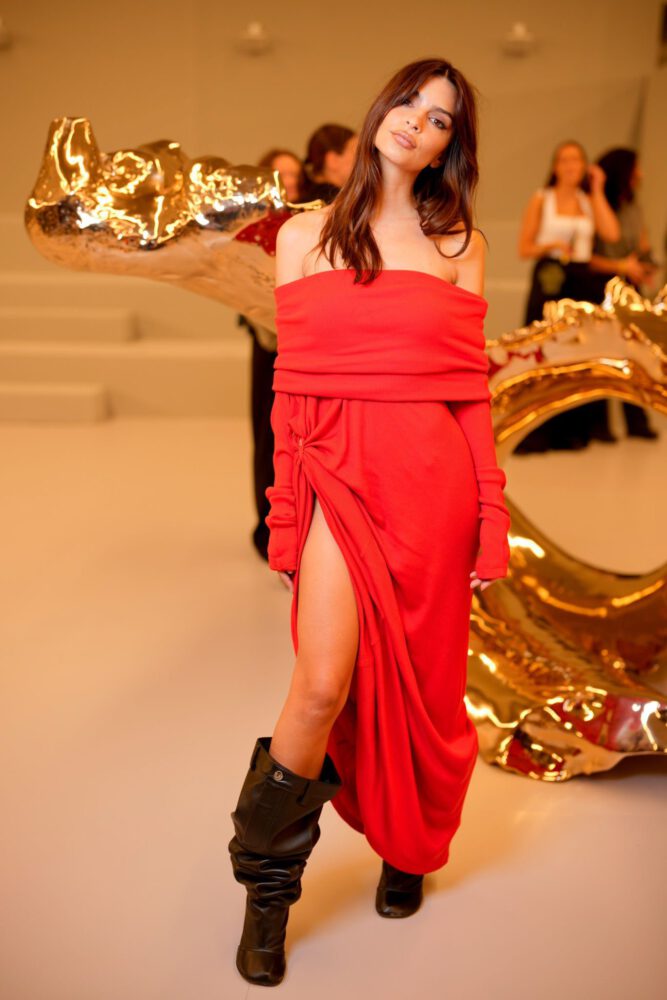 Emily Ratajkowski In A Red Dress With A Daring Slit, Showcasing Her Sexy Legs.